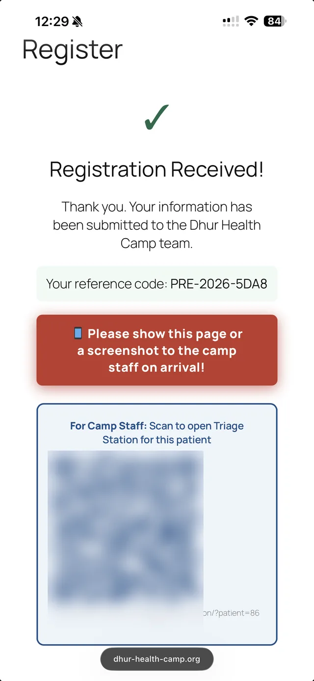 The registration screen on a phone: registration received, with a reference code
